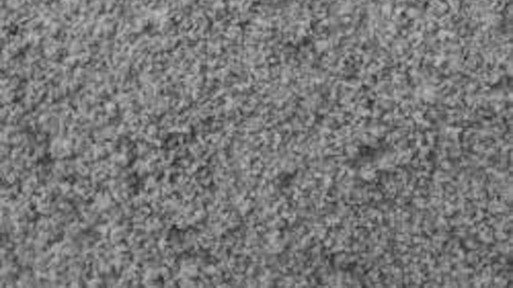 The picture was captured by the microscopic imager located on the Mars Exploration Rover Spirit's instrument deployment device, or "arm." The actual size of the patch is a section of the field of view which was 3 centimeters (1.2 inches) across. (Courtesy of NASA/JPL)