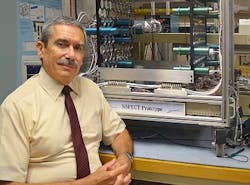 James Ryan beside the Portable Neutron Spectroscope (NSPECT). The instrument was conceived, designed, and tested to image and measure sources of neutron radiation. Photo by Kristi Donahue, UNH-EOS James Ryan beside the Portable Neutron Spectroscope (NSPECT). The instrument was conceived, designed, and tested to image and measure sources of neutron radiation. Photo by Kristi Donahue, UNH-EOS