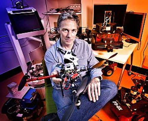 Professor Peter Corke of Queensland University of Technology with the unmanned aerial vehicle developed to enable improvements in crop spraying