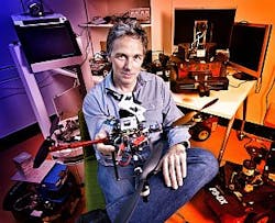 Professor Peter Corke of Queensland University of Technology with the unmanned aerial vehicle developed to enable improvements in crop spraying Professor Peter Corke of Queensland University of Technology with the unmanned aerial vehicle developed to enable improvements in crop spraying