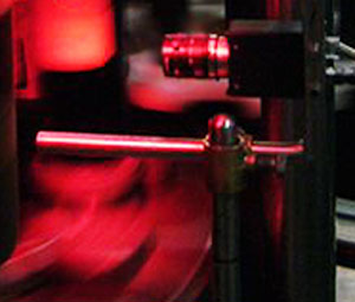 Vision system captures images of packaged products