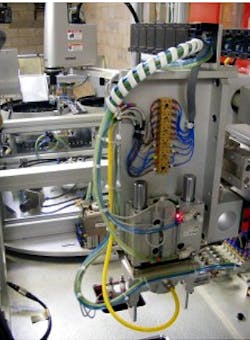 Vision assisted robot automates spigot production Vision assisted robot automates spigot production