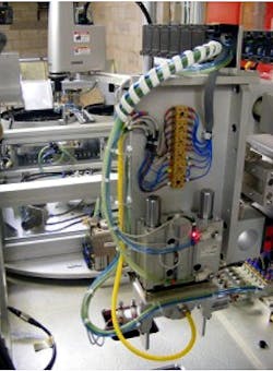 Vision assisted robot automates spigot production