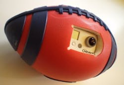 Researchers from Carnegie Mellon University and the University of Electro-Communications have shown that a camera embedded in the side of a rubber-sheathed plastic foam football can record video while the ball is in flight, along with developing a computer algorithm that converts the raw video into a stable, wide-angle view. Researchers from Carnegie Mellon University and the University of Electro-Communications have shown that a camera embedded in the side of a rubber-sheathed plastic foam football can record video while the ball is in flight, along with developing a computer algorithm that converts the raw video into a stable, wide-angle view.