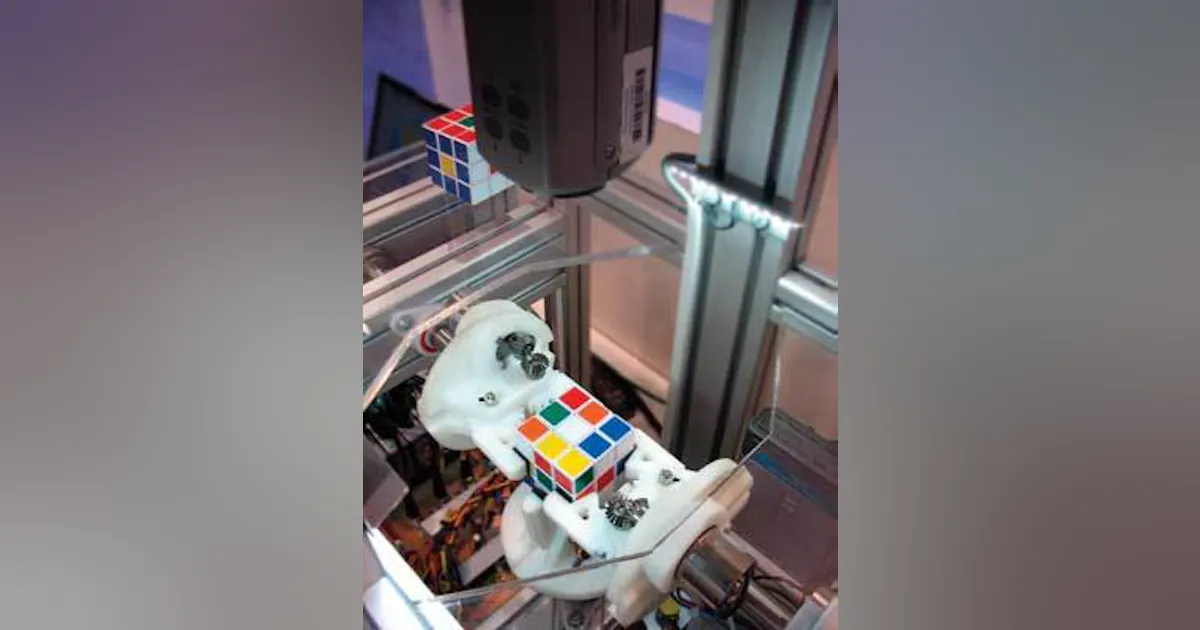 Robots and vision solve Rubik’s cube | Vision Systems Design