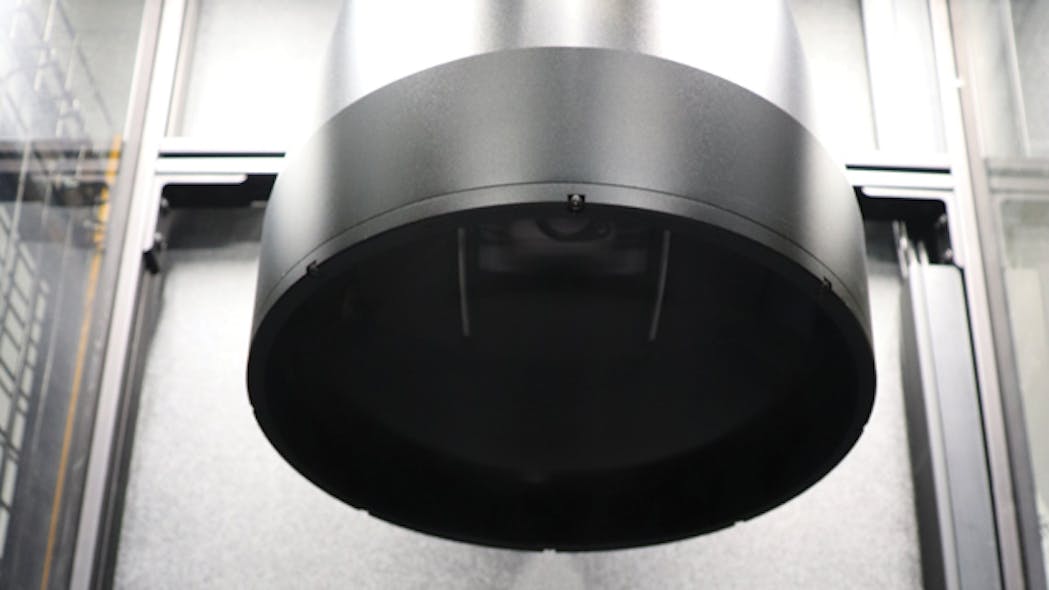 A large format, bi-telecentric lens provides a 240 mm field of view at a 375 mm working distance above the tray, where parts are gauged for required measurements.