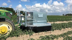 Figure 3. The measurement system was mounted on the front of a tractor driving at a constant speed of 300 m / hour (0.08 m/s). Figure 3. The measurement system was mounted on the front of a tractor driving at a constant speed of 300 m / hour (0.08 m/s).