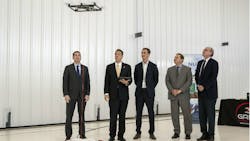 Governor Andrew Cuomo (second from left) tries his hand at drone piloting. Governor Andrew Cuomo (second from left) tries his hand at drone piloting.