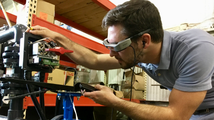 Figure 1 - Actuated valve positioner wiring and configuration is checked on site and verified remotely by Matthew Miles, Technician, using the Epson Moverio smart glasses and Moverio Assist.