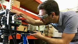 Figure 1 - Actuated valve positioner wiring and configuration is checked on site and verified remotely by Matthew Miles, Technician, using the Epson Moverio smart glasses and Moverio Assist. Figure 1 - Actuated valve positioner wiring and configuration is checked on site and verified remotely by Matthew Miles, Technician, using the Epson Moverio smart glasses and Moverio Assist.