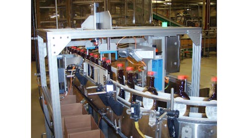 Figure 1: EPIC&rsquo;s machine vision system is designed to run at more than 500 inspections per minute to ensure syrup bottle verification prior to packing.