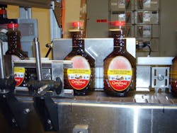 Figure 3: The machine vision system ensures that only bottles that have been verified as correct make it into the case for shipping.