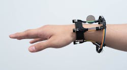 Figure 1: The FingerTrak hand tracking system consists of four miniature thermal cameras mounted on a wristband.