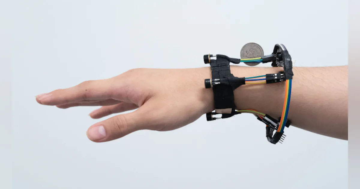 new hand tracking system uses miniature thermal cameras on wristband ...