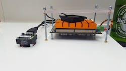 Figure 1: The prototype device pictured here comprises a Basler MIPI CSI-2 camera with S-Mount lens, SMX8 SMARC 2.0 Computer on Module from Congatec based on an MX 8M applications processor from NXP Semiconductors, and deep learning software from Irida Labs. Figure 1: The prototype device pictured here comprises a Basler MIPI CSI-2 camera with S-Mount lens, SMX8 SMARC 2.0 Computer on Module from Congatec based on an MX 8M applications processor from NXP Semiconductors, and deep learning software from Irida Labs.