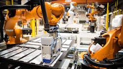 A Kuka KR 09 robot processes maritime battery parts at a Siemens production facility in Trondheim, Norway.