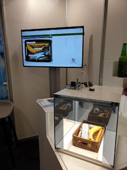 Figure 2: A customer places food and beverage items on a tray and proceeds to a checkout terminal, where the smart retail system offers instant checkout capabilities, leading to shorter and faster lines. Figure 2: A customer places food and beverage items on a tray and proceeds to a checkout terminal, where the smart retail system offers instant checkout capabilities, leading to shorter and faster lines.