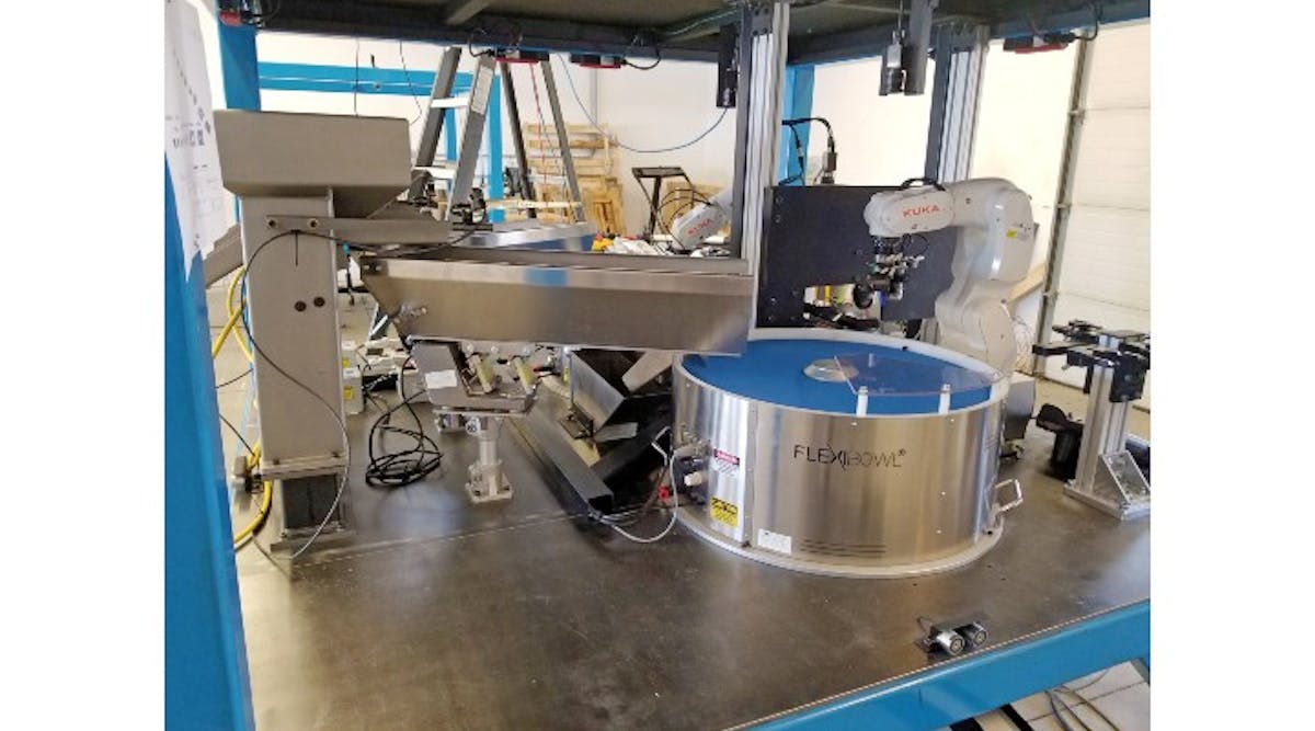 Figure 1: Metal and plastic automotive parts feed from a hopper into vibratory feeders, and then into programmable FlexiBowl feeders that separate the parts, allowing a robot to make picks. (Photos courtesy of Skye Automation.)