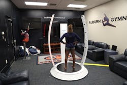 Figure 2: The AVA kiosk scans athletes to generate 3D data that becomes the basis for their custom avatars.