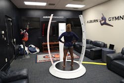 Figure 2: The AVA kiosk scans athletes to generate 3D data that becomes the basis for their custom avatars. Figure 2: The AVA kiosk scans athletes to generate 3D data that becomes the basis for their custom avatars.