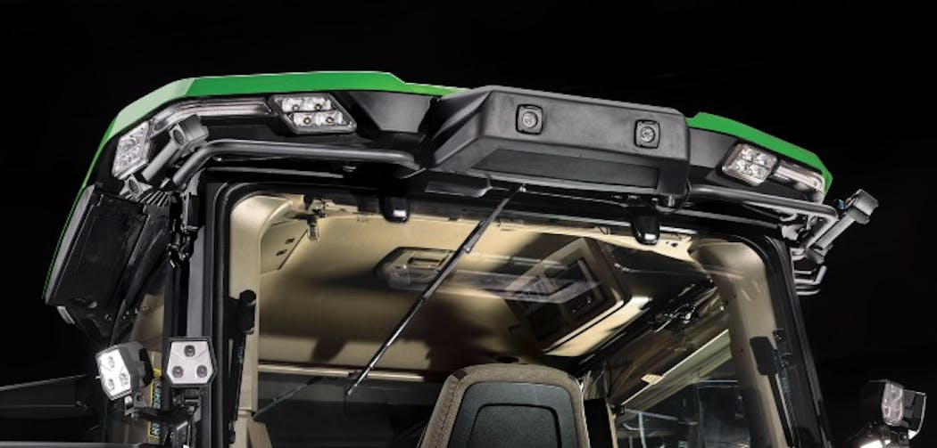 Three pairs of stereo cameras (rear facing) are mounted to the cab: one pair on the left, one pair on the right, and one pair pointed toward the rear of the tractor.