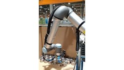 Figure 3: This photo shows an application with ZF, a glob al technology company headquartered in Friedrichshafen, Germany. It uses the Micropsi MIRAI robot control system to automate machine tending in a high-volume milling station where gears are manufactured. Figure 3: This photo shows an application with ZF, a glob al technology company headquartered in Friedrichshafen, Germany. It uses the Micropsi MIRAI robot control system to automate machine tending in a high-volume milling station where gears are manufactured.