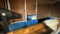 Inside an enclosure, the Surface Finish Inspector, includes a mirror, which folds the optical path. Inside an enclosure, the Surface Finish Inspector, includes a mirror, which folds the optical path.