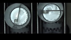 Figure 2: SICK trained deep learning algorithms to confirm the presence of plastic scoops resting on a reflective aluminum surface. Figure 2: SICK trained deep learning algorithms to confirm the presence of plastic scoops resting on a reflective aluminum surface.