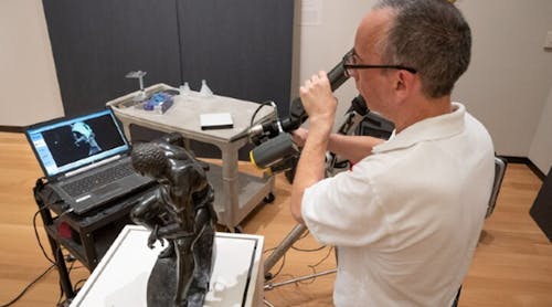 An NVision engineer prepares to conduct a 3D scan of &apos;The Freedman,&apos; a statue created in 1863.