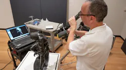 An NVision engineer prepares to conduct a 3D scan of 'The Freedman,' a statue created in 1863.