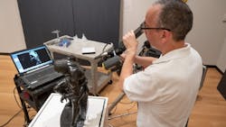 An NVision engineer prepares to conduct a 3D scan of 'The Freedman,' a statue created in 1863. An NVision engineer prepares to conduct a 3D scan of 'The Freedman,' a statue created in 1863.