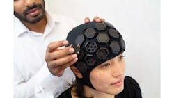 Figure 1: The researchers use LUMO, a wearable, portable, high-density functional NIR imaging device equipped with modular tiles with built-in NIR light sources and detectors. Figure 1: The researchers use LUMO, a wearable, portable, high-density functional NIR imaging device equipped with modular tiles with built-in NIR light sources and detectors.