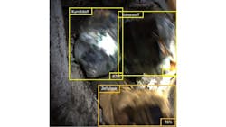 Photo image taken from cameras mounted inside of a waste disposal truck's pour chamber. The cameras capture images of items emptied into a truck's pour chamber. Photo image taken from cameras mounted inside of a waste disposal truck's pour chamber. The cameras capture images of items emptied into a truck's pour chamber.