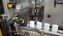 Figure 1: Vision system classifies cosmetic defects on deodorant containers. Figure 1: Vision system classifies cosmetic defects on deodorant containers.