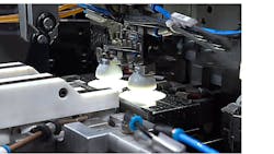 The system inspects the bottle cap tops for print and image errors. The system inspects the bottle cap tops for print and image errors.