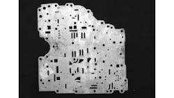 Figure 4: In contrast to physical gauging, non-contact metrology using machine vision must rely on surface features as imaged perpendicular to the sensor, as is clearly represented on this automotive transmission plate. Figure 4: In contrast to physical gauging, non-contact metrology using machine vision must rely on surface features as imaged perpendicular to the sensor, as is clearly represented on this automotive transmission plate.
