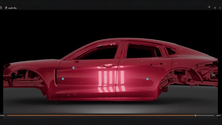 Figure 1: Porsche uses a machine vision system that projects patterns of light onto the surface of a car, and the reflections are captured in images.