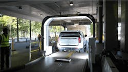 Figure 2: A vehicle goes through an inspection station. Figure 2: A vehicle goes through an inspection station.