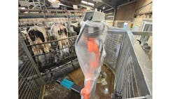 Fisher Smith developed a robotic system that automatically inspects and cleans each cow as they rotate through the milking carousel. Fisher Smith developed a robotic system that automatically inspects and cleans each cow as they rotate through the milking carousel.