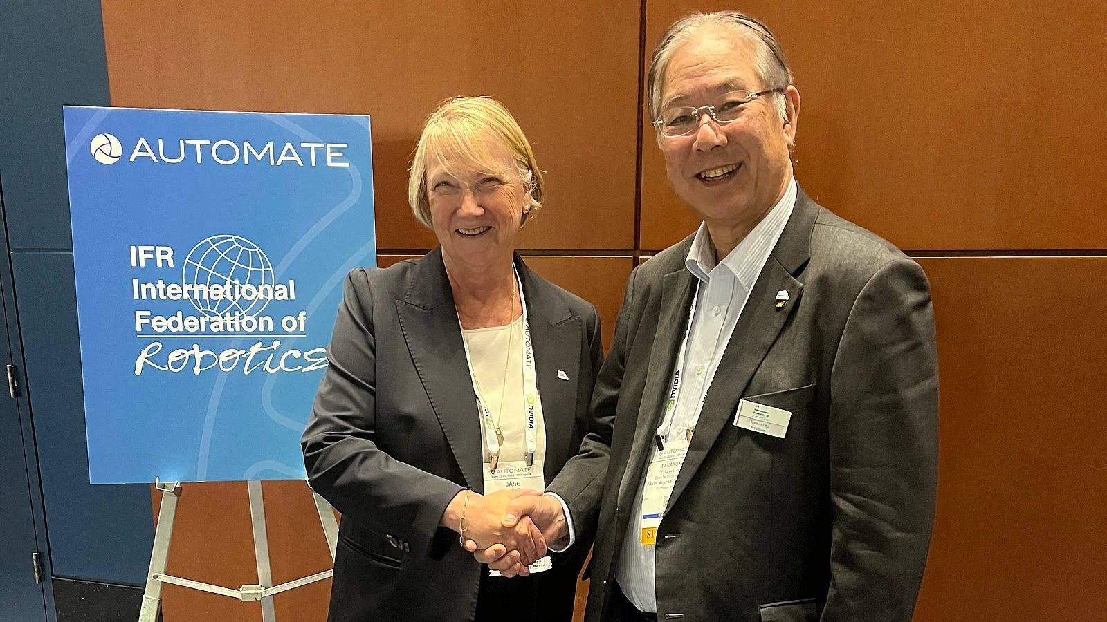 Incoming IFR President Jane Heffner, left, and outgoing president Takayuki Ito.