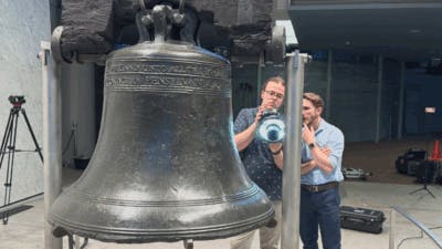 Alexander Fisher and Remington Orange scan the Liberty Bell.
