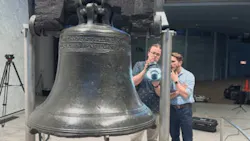Alexander Fisher and Remington Orange scan the Liberty Bell.