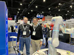 Dr. Lau poses with his former student Peter Ferland, field application engineer at BlackBerry QNX, at the 2026 Automate Show.